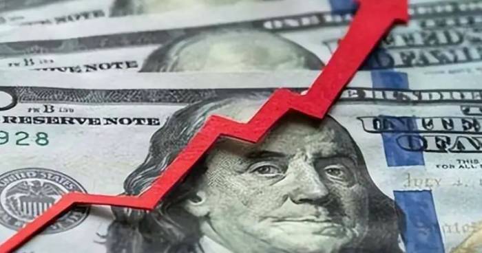 Offshore Yuan Plummets as Dollar and U.S. Stocks Surge